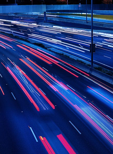 Multi lane highway with motion blur of vehicle lights