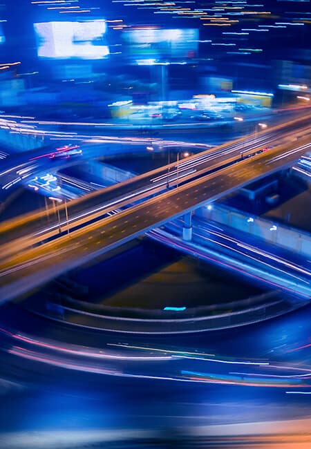 A timelapse photo of a highway overpass.