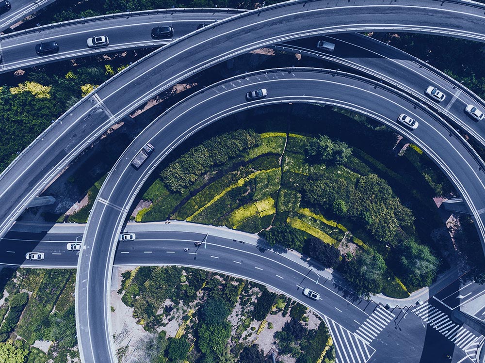 roadways intersecting over highway