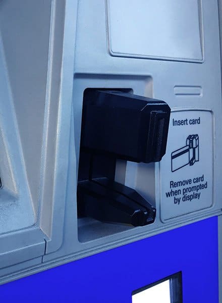 A chip card reader on a gas pump at a gas station.