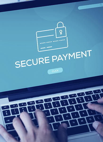 Laptop screen shows a secure payment teal screen with a click button
