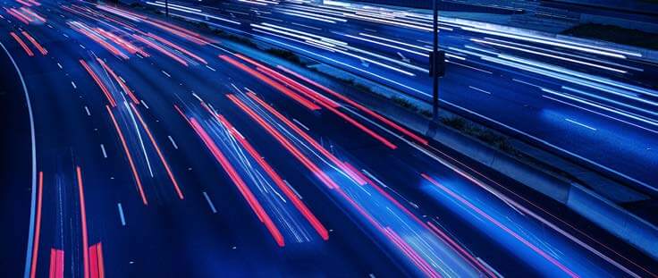 Timelapse image of cars speeding by at night!