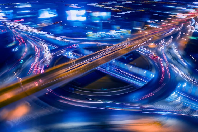 Cars on a city highway at night