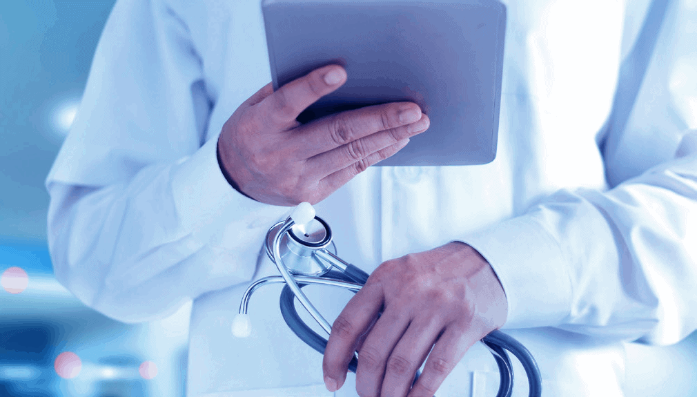 doctor holding a tablet