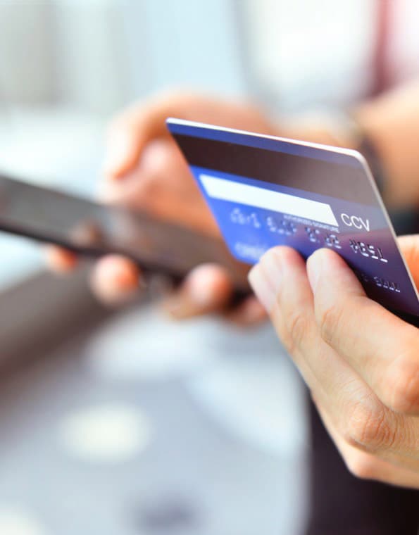 Woman making bill payment on phone