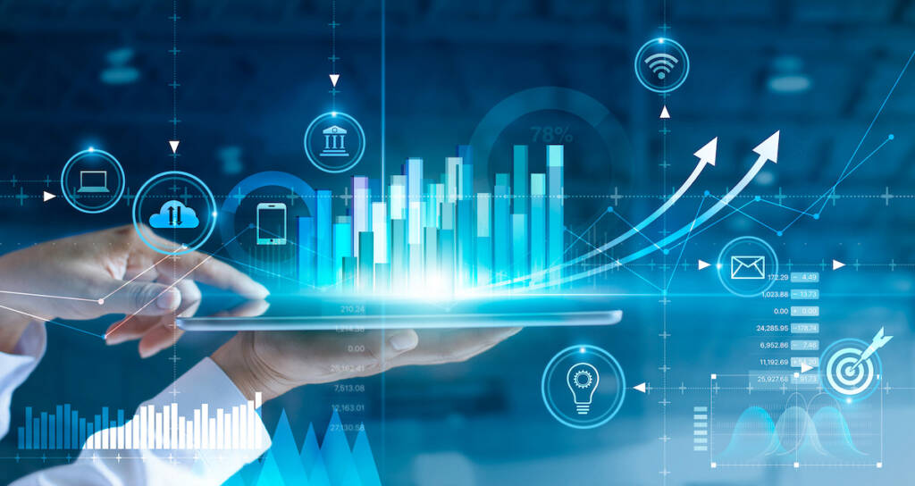 Businessman using tablet analyzing sales data and economic growth graph chart. Business strategy.